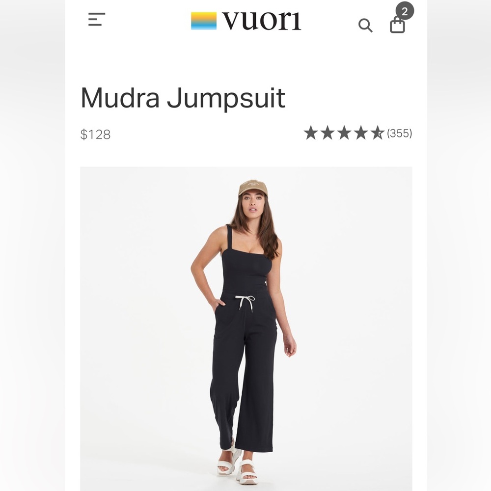Vuori Mudra Jumpsuit, black Sz M. Worn 1x. Like new with built in bra + pads